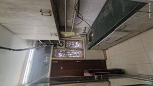 Kitchen in 1 RK Apartment at Raheja Atlantis II, Sector 31 – for Rent