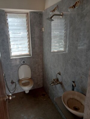 Bathroom in 2 BHK Apartment at Bharat Ecovistas, Shilphata – for Sale