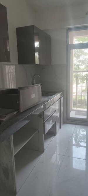Kitchen in 1 BHK Apartment at Anant Metropolis Insignia Towers, Kasarvadavali – for Rent