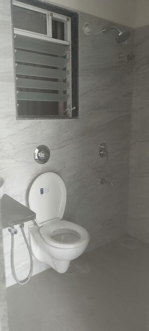 Bathroom in 1 BHK Apartment at Anant Metropolis Insignia Towers, Kasarvadavali – for Rent