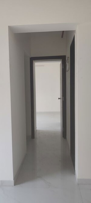 Building Lobby in 1 BHK Apartment at Anant Metropolis Insignia Towers, Kasarvadavali – for Rent