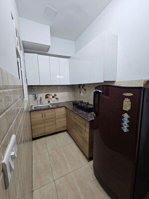 Kitchen in 2 BHK Apartment at Gaur City 2 - 14th Avenue, Sector 16c Greater Noida – for Rent