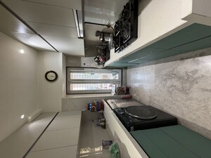 Kitchen in 2 BHK Apartment at Blue Mountain Towers, Shashtri Nagar – for Sale