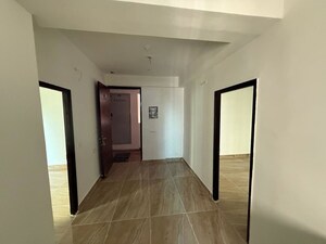 Building Lobby in 2 BHK Apartment at Migsun Twiinz, Eta Ii Greater Noida – for Sale