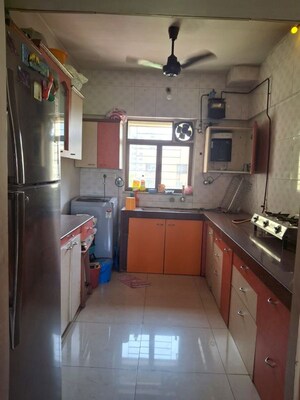 Kitchen in 3 BHK Apartment at Jasmine Tower, Vasant Vihar – for Sale