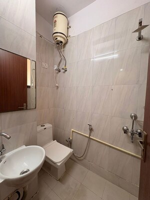 Bathroom in 2 BHK Builder Floor at Chattarpur – for Rent