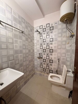 Bathroom in 2 BHK Builder Floor at Chattarpur – for Rent