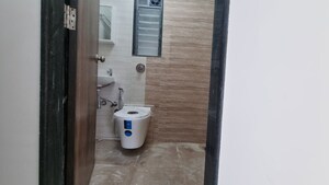 Bathroom in 2 BHK Apartment at Om New Aashirwad CHS, Malad West – for Rent