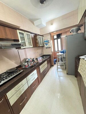 Kitchen in 3 BHK Apartment at GHP Neptune Suncity, Vikhroli West – for Rent