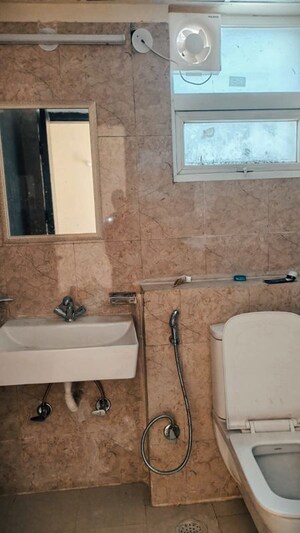 Bathroom in 2 BHK Apartment at Sikka Kaamna Greens, Sector 143a Noida – for Rent