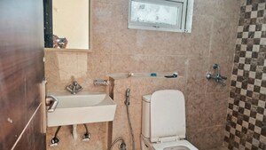 Bathroom in 2 BHK Apartment at Sikka Kaamna Greens, Sector 143a Noida – for Rent