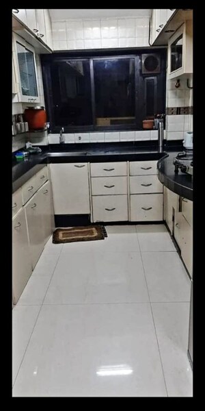 Kitchen in 2 BHK Apartment at Ganesh CHS Andheri West, Andheri West – for Rent