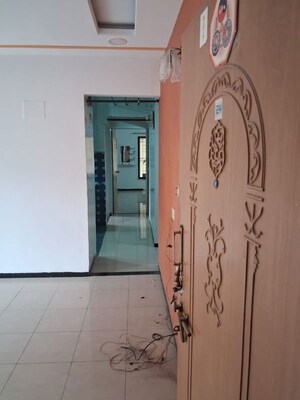 Building Lobby in 2 BHK Apartment at Mansi Maniratna Complex, Walvekar Nagar – for Rent