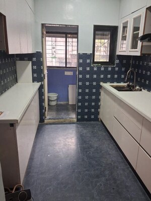 Kitchen in 2 BHK Apartment at Mansi Maniratna Complex, Walvekar Nagar – for Rent
