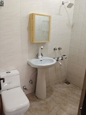 Bathroom in 1 RK Apartment at Arun Vihar Sector 37, Sector 37 – for Rent