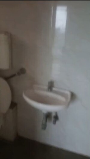 Bathroom in 2 BHK Apartment at Bharat Ecovistas, Shilphata – for Rent