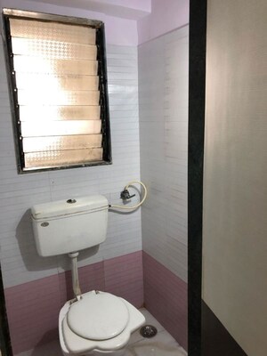 Bathroom in 1 BHK Apartment at Rajshree Iris, Tilak Nagar – for Rent