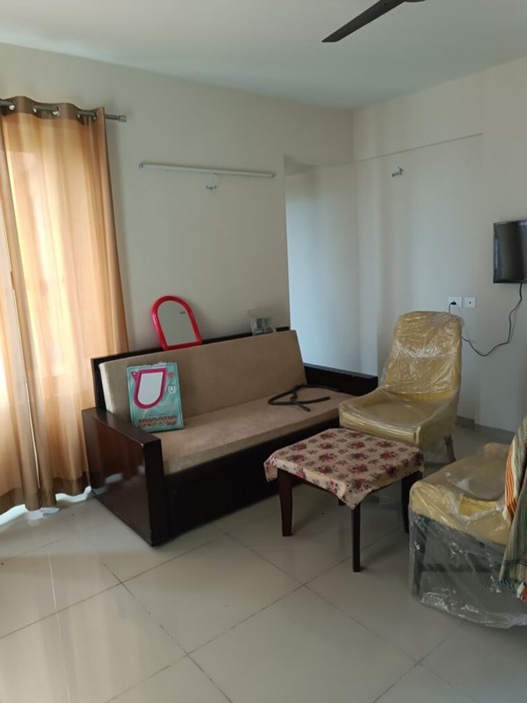Living Room, wave-dream-homes 1 Bedroom 580 Sq.Ft. Apartment In Wave City Ghaziabad 10364569