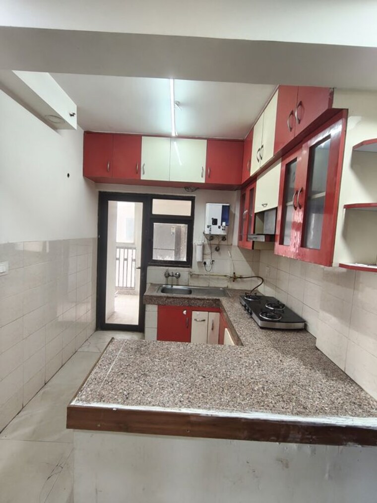 Kitchen, logix-blossom-county 2 Bedroom 945 Sq.Ft. Apartment In Sector 137 Noida 10364697