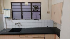 Kitchen in 1 BHK Apartment at Dhanlaxmi Park, Kothrud – for Rent