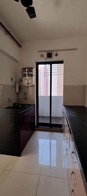 Kitchen in 2 BHK Apartment at Shapoorji Pallonji Joyville Hinjewadi, Hinjewadi – for Sale