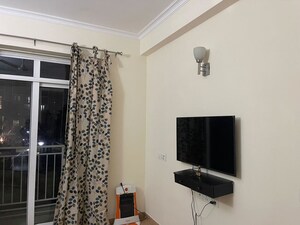 Living Room in 2 BHK Apartment at Jaypee Greens Pavilion Court, Sector 128 – for Rent