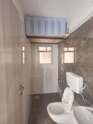 Bathroom in 1 BHK Apartment at Charms Global City, Ambernath East – for Rent