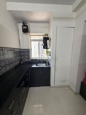 Kitchen in 1.5 BHK Apartment at Lodha Amara New Tower, Kolshet Road – for Rent