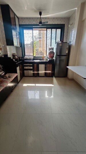 Kitchen in 2 BHK Apartment at Gauri Shankar CHS, Dombivli West – for Rent