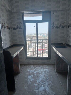 Room in 2 BHK Apartment at National Trinity Paradise, Shilphata – for Sale