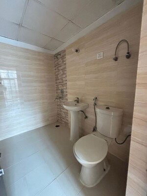 Bathroom in 3 BHK Apartment at Amrapali Platinum, Sector 119 – for Sale