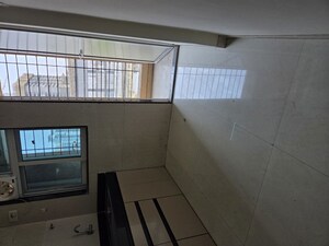 Kitchen in 1 BHK Apartment at Cosmos Habitat, Majiwada – for Rent
