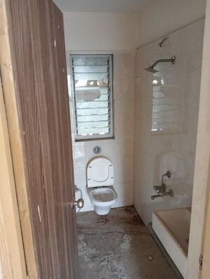 Bathroom in 2 BHK Apartment at Bharat Ecovistas, Shilphata – for Sale