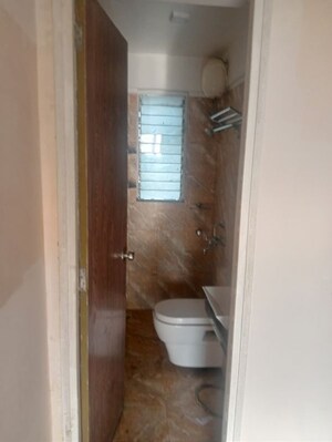 Bathroom in 2 BHK Apartment at Bharat Ecovistas, Shilphata – for Rent