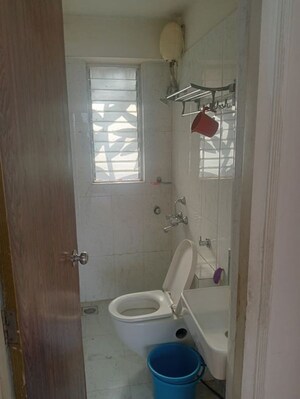 Bathroom in 2 BHK Apartment at Bharat Ecovistas, Shilphata – for Rent