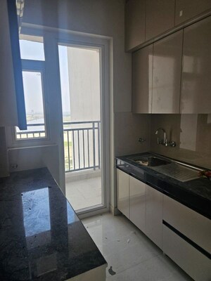 Kitchen in 2 BHK Apartment at Eldeco Live By The Greens, Sector 150 – for Rent