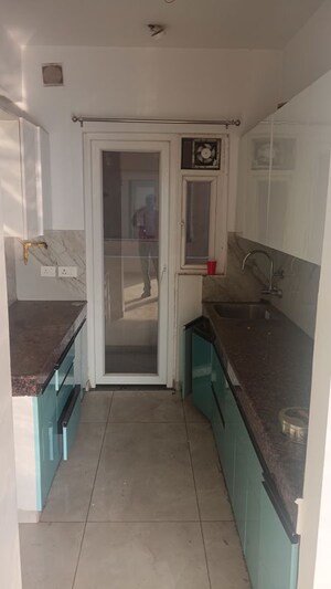 Kitchen in 3 BHK Apartment at Ace Medley Avenue, Sector 150 – for Rent