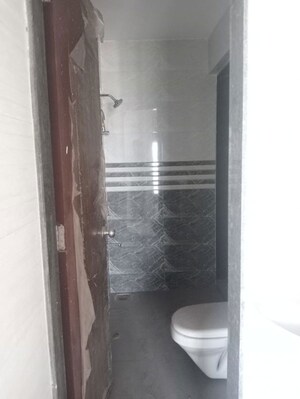 Bathroom in 1 BHK Apartment at National Trinity Paradise, Shilphata – for Sale