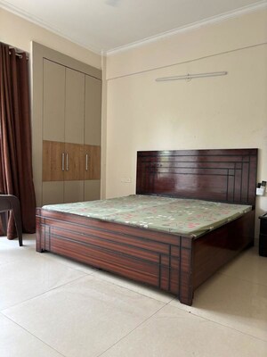 Bedroom in 3 BHK Apartment at Affinity Greens, International Airport Road – for Rent