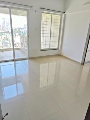 Living Room in 1 BHK Apartment at Mantra Essence, Undri – for Rent