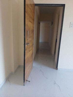 Building Lobby in 1 BHK Apartment at Safa Complex, Shilphata – for Rent