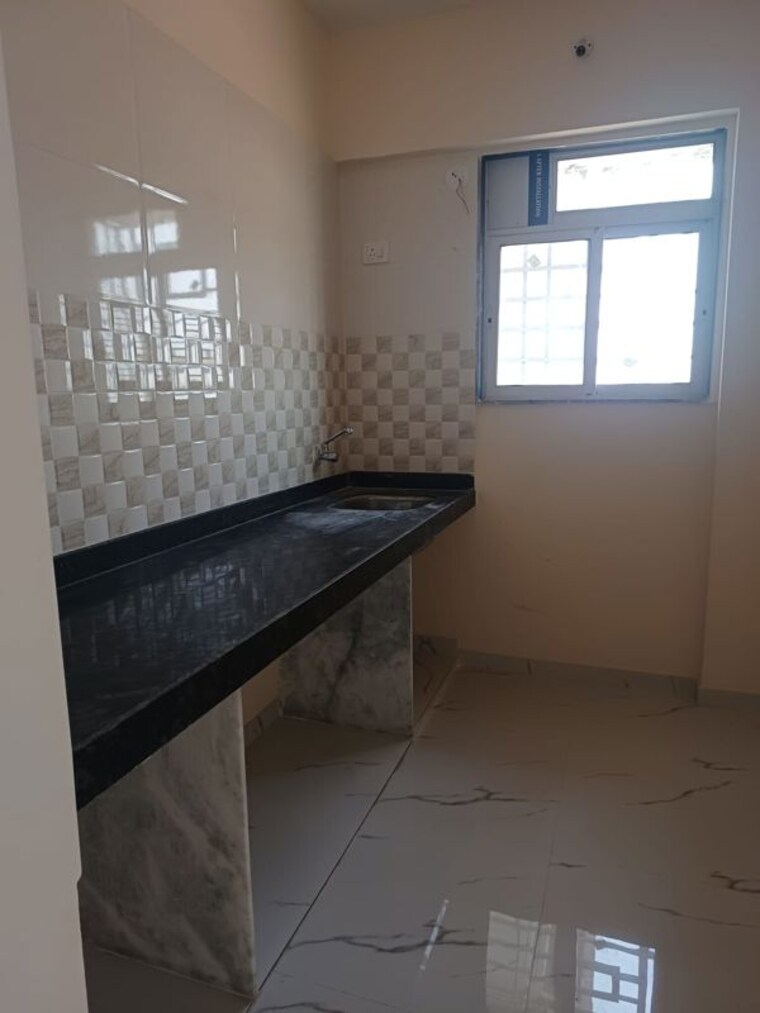 Kitchen, safa-complex 1 Bedroom 980 Sq.Ft. Apartment In Shilphata Thane 10364857