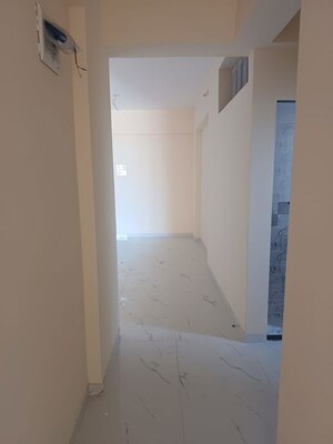 Building Lobby in 1 BHK Apartment at Safa Complex, Shilphata – for Rent