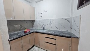 Kitchen in 1 BHK Apartment at Freedom Fighters Enclave – for Sale