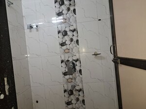 Bathroom in 1 RK Apartment at NG Suncity, Kandivali East – for Rent