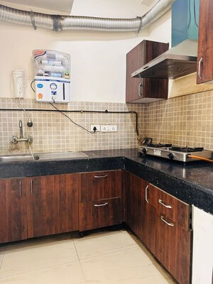 Kitchen in 2.5 BHK Apartment at Nimbus The Golden Palm, Sector 168 – for Rent