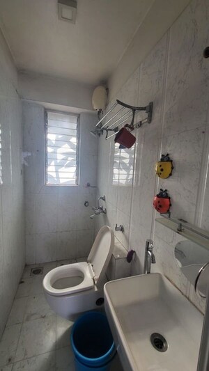 Bathroom in 2 BHK Apartment at Bharat Ecovistas, Shilphata – for Rent