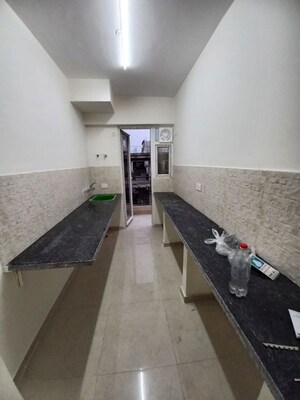Kitchen in 2 BHK Apartment at Signature The Millennia 2, Sector 37d – for Rent