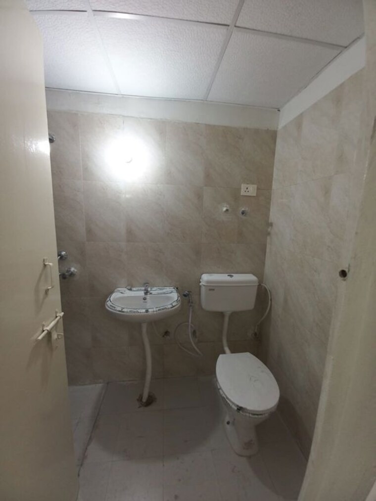 Bathroom, signature-the-millennia-2 2 Bedroom 700 Sq.Ft. Apartment In Sector 37d Gurgaon 10365467