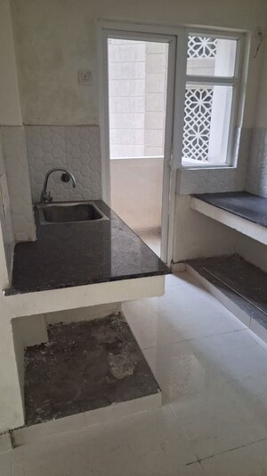 Kitchen in 2 BHK Apartment at ACE Golf Shire, Sector 150 – for Rent